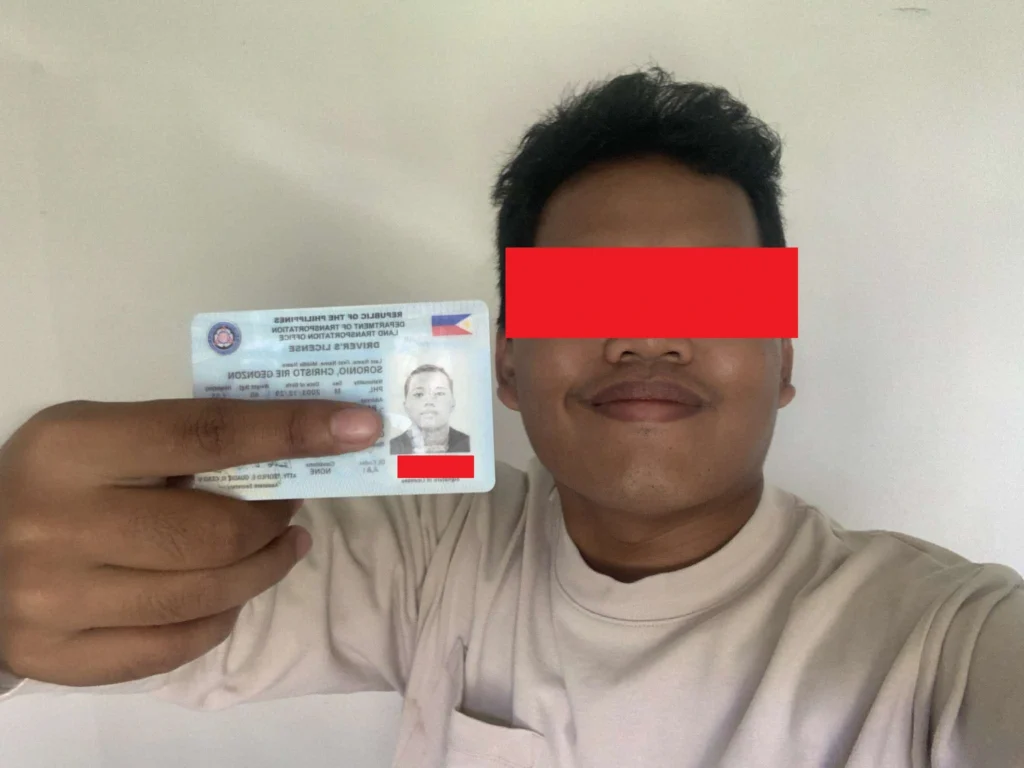 Chris Soronio holding his drivers license